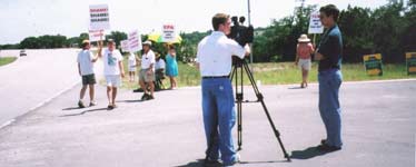 The media covering our demonstration 7/17/04.