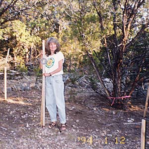 Susan staking out her house site.